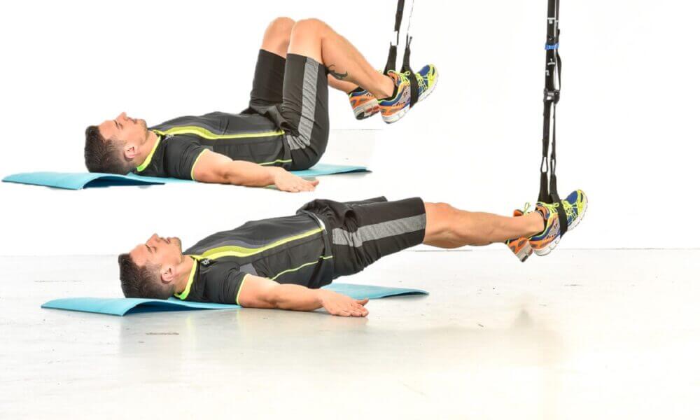 Flexiones de piernas en TRX